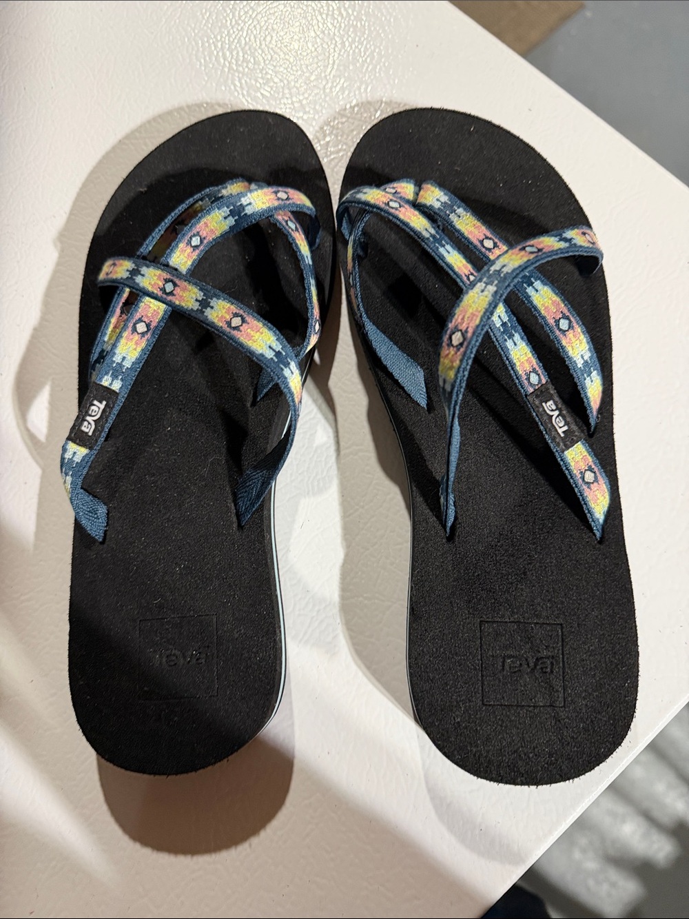 Teva Women’s Black Sandals with Blue and Yellow Patterned Straps